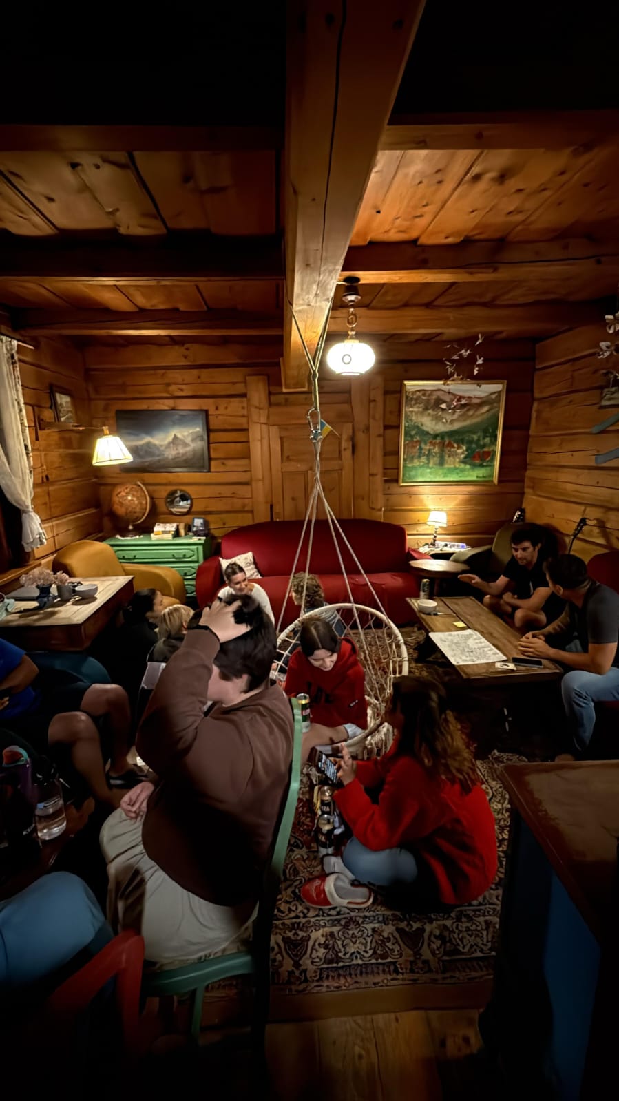 Guests in the common area at Good Bye Lenin Hostel